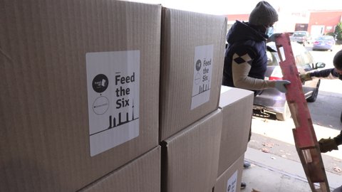Toronto, Ontario, Canada November 2020 Volunteers prepare food bank aid Toronto people in COVID 19 Pandemic recession