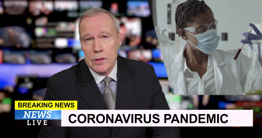 Male television news presenter in tv studio, breaking news about coronavirus vaccine Royalty-Free Stock Footage #1062561625
