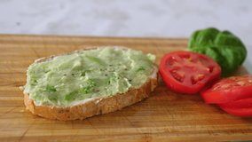 Finishing Homemade nutrition breakfast with sandwich, lettuce leaf, tomato