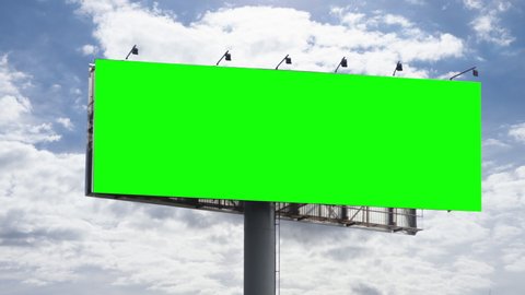  Empty large billboard with a green screen for advertising against sky with clouds timelapse 