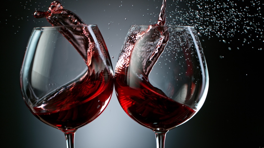Super Slow Motion Shot of Clinking Two Glasses of Red Wine at 1000fps. | Shutterstock HD Video #1062570424