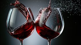 Super Slow Motion Shot of Clinking Two Glasses of Red Wine at 1000fps. - Powered by Shutterstock - Get 15% off with code: PIKWIZARD15