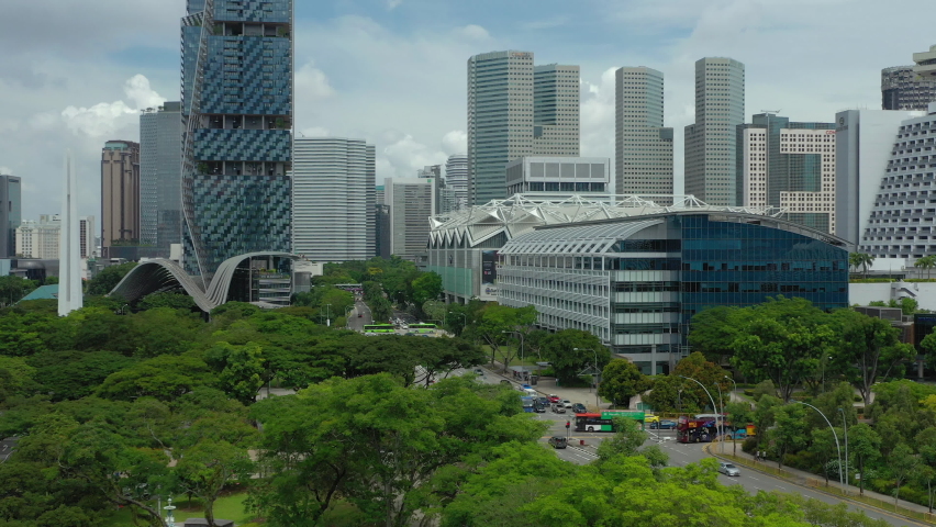 sunny day singapore city center famous raffles district traffic street aerial panorama 4k