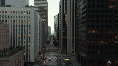Endless Skyscrapers Urban Canyon of City Main Street Downtown Area in Los Angeles, Scenic Establishing Shot Dolly in, Aerial Drone perspective