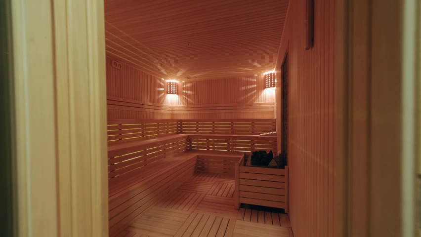 the inside of the sauna. 4K. Standard wooden sauna room interior Royalty-Free Stock Footage #1062585265