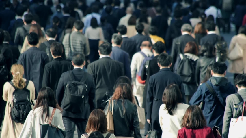 Procession of Japanese businessmen going to work | Shutterstock HD Video #1062593629