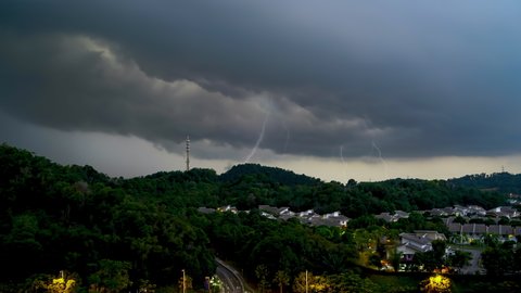 4K UHD ProRes 422 Timelapse Footage Of multiple Lightning strikes during thunder storm over a hill view