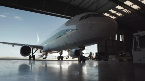 Jet being pushed out of hanger