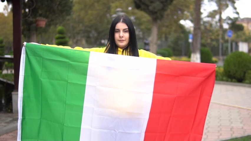 Girl holding flag of italy