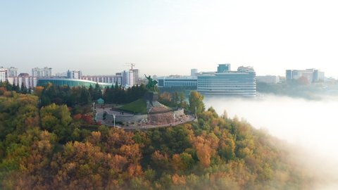 Aerial Shot of cultural and historical center of Ufa. The capital of Bashkortostan at beautiful sunset in the fog. Russia / City Center. High quality 4k footage