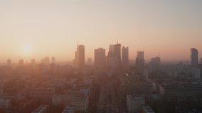 Morning flight over Warsaw. Sunrise and fog. - Powered by Shutterstock - Get 15% off with code: PIKWIZARD15