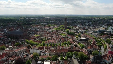 4k cinematic aerial video with motion of the city center of Amersfoort, the Netherlands, on a sunny day with white clouds
