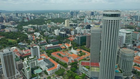 flight over singapore center famous towers cityscape aerial panorama 4k