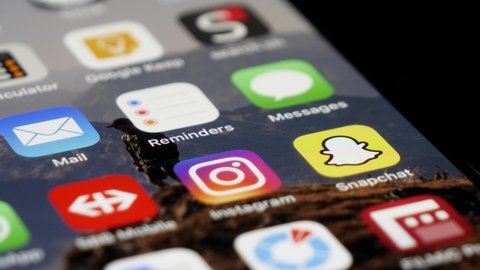 Bilten / Switzerland - 01 24 2020: Snapchat Social Media App Opening by Iphone User