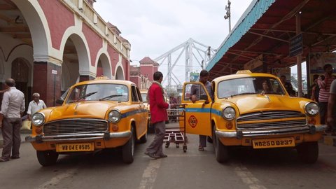 Kolkata, India - Circa November 2019. Taxi stand near the Howrah railway station in Kolkata.