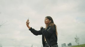 Beautiful Young Woman Dancing Taking Selfie Video Using Smartphone Red Helium 8K