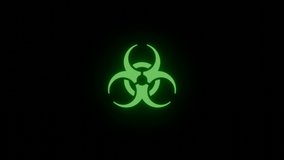Rotating green glow biohazard icon sign isolated on black vfx video element