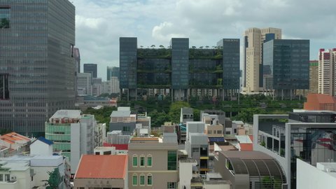 singapore city day time famous downtown green building front aerial panorama 4k