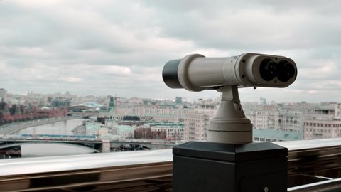 Binocular for observing the Moscow Kremlin. Kremlin surveillance. Big Brother is watching the Kremlin