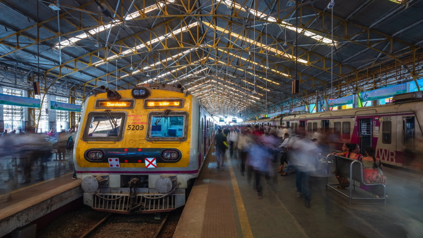 Mumbai, India - March 02, 2019: Timelapse view of trains arriving and departing at Churchgate Railway Station in central Mumbai, Maharashtra, India. 