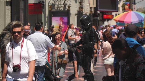 Los Angeles , CA / United States - 05 22 2019: Costumed Star Wars street performers outside Grauman's Chinese Theater interacting with tourists