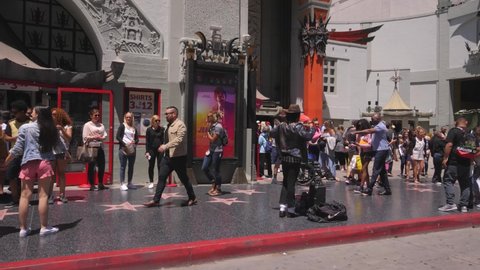 Los Angeles , CA / United States - 05 22 2019: Michael Jackson impersonator performs for tourists at Grauman's Chinese Theater in Hollywood