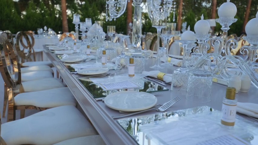 Wedding day event organization table setting decor. luxury event. Royalty-Free Stock Footage #1062764116