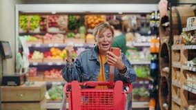 Blonde caucasian woman mother achieving goal sharing great news showing family enjoying successful event celebrating victory on food shopping supermarket. - Powered by Shutterstock - Get 15% off with code: PIKWIZARD15