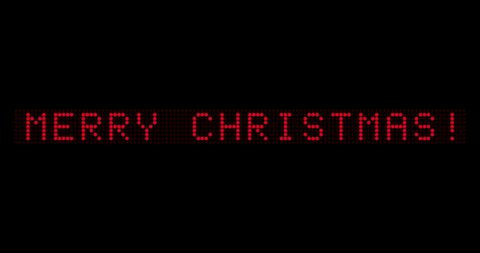 Merry Christmas! Animated text on an electronic Board with gradual appearance and blinking. Stock video
