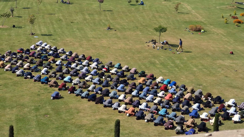 People praying Islamic way of prayers nimaz with social distancing during corona-virus. Royalty-Free Stock Footage #1062792001