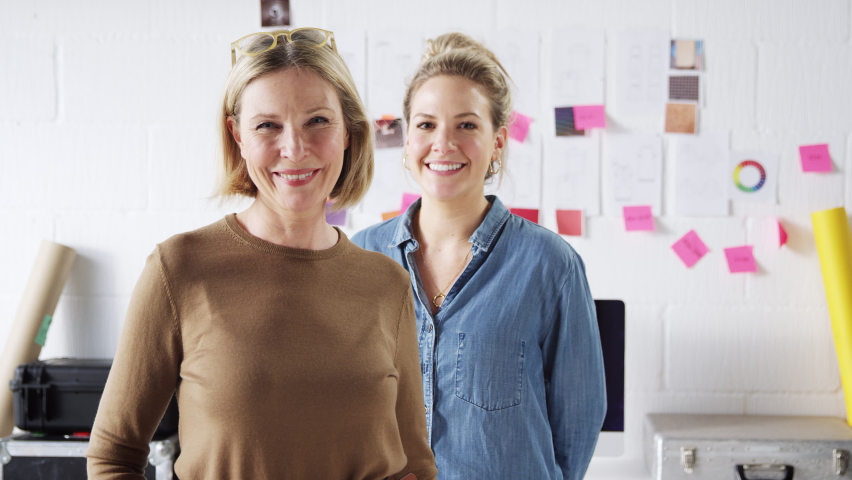 Portrait Of Two Smiling Women Running Creative Business In Studio Together Royalty-Free Stock Footage #1062799495