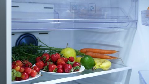 Child Opening Fridge, Strawberry, Bananas, Cherries, Apples and Vegetables in Refrigerator, Girl at Diet, Healthy Food in Kitchen