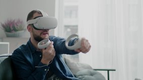 Male Play With Virtual Reality Glasses and Controllers