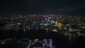 Establishing Aerial View Shot of London UK, entrance to the city, Financial District & City of London, United Kingdom, at night evening, reverse shot