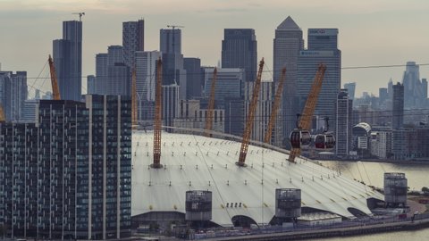 Establishing Aerial View Shot of London UK, entrance to the city Greenwich Peninsula, Financial District City of London, United Kingdom, slow reveal