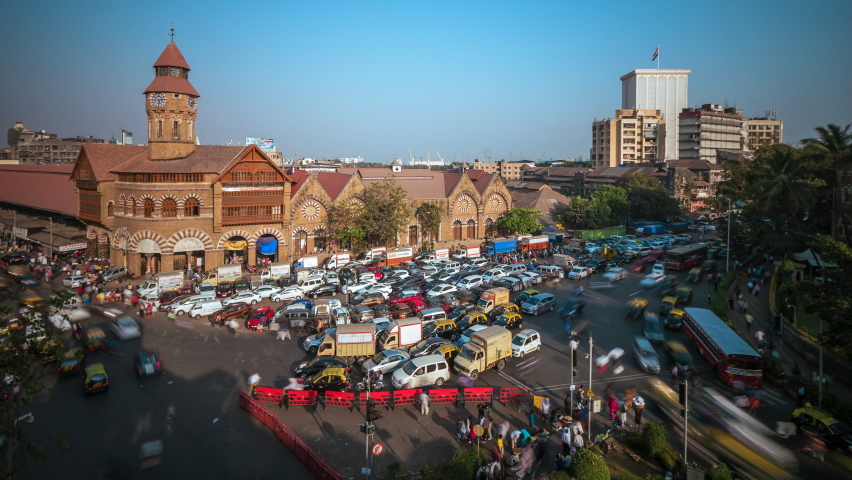 Time lapse view of rush hour traffic outside historical landmark Crawford Market in Mumbai, Maharashtra, India.  Royalty-Free Stock Footage #1062817570
