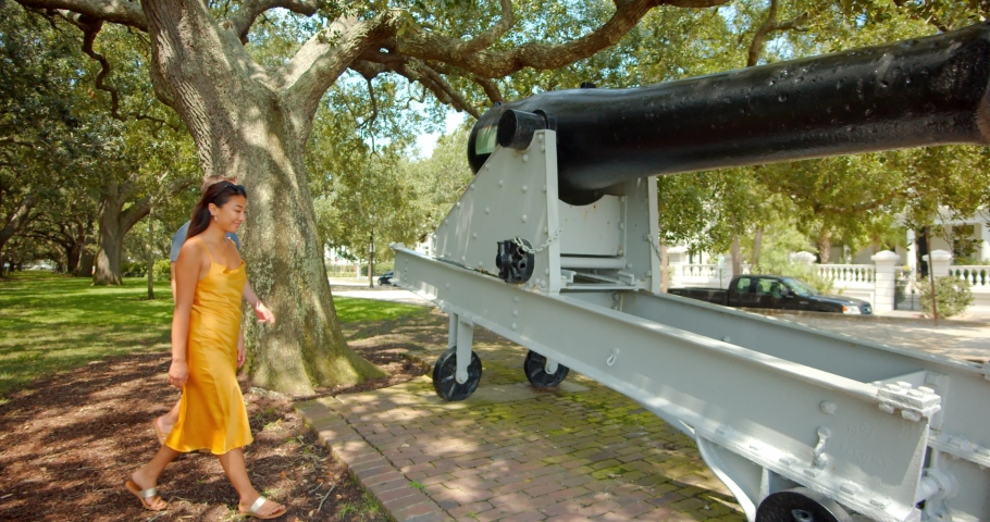 Couple Walking Past Historic Cannons in Park, Charlotte
