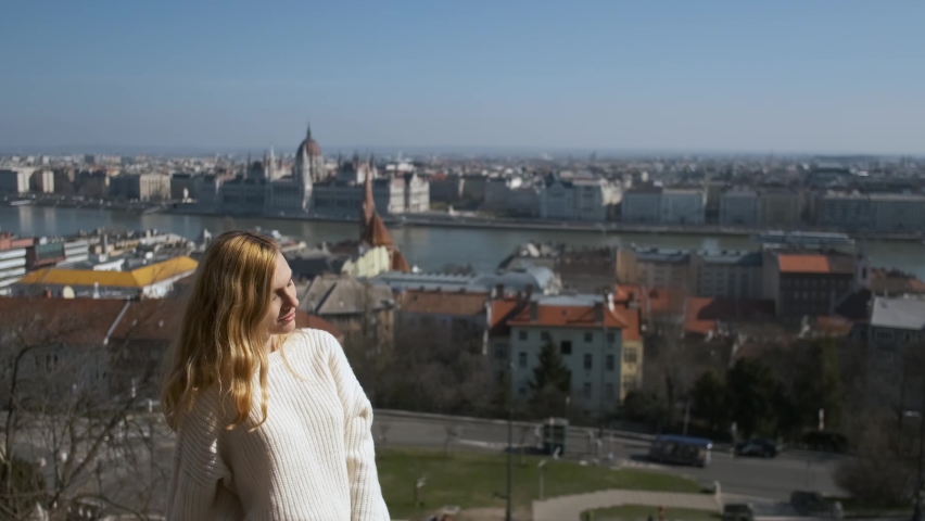 stylish caucasian woman overlooking budapest