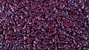 Close up Scattered red beans on the table. High protein legumes, beans and lentils for healthy food.