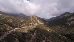 Extreme ride on the red Lamborghini Gallardo at Angeles Crest Hwy. Shooting from a helicopter.