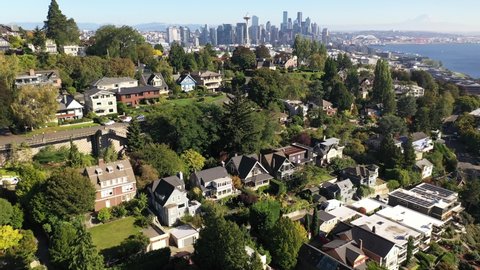 Drone footage of Marshall Park, Parsons Gardens, West Queen Anne, Lower Queen Anne, downtown Seattle, Mt. Rainier, upscale, affluent neighborhoods uptown by Puget Sound, in Seattle, Washington