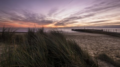 Stunning sunrise at Southwold beach in Suffolk UK England 4K timelapse  with motion control camera movement