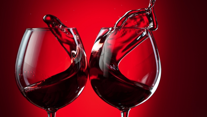 Super Slow Motion Shot of Clinking Two Glasses of Red Wine at 1000fps. | Shutterstock HD Video #1062868105