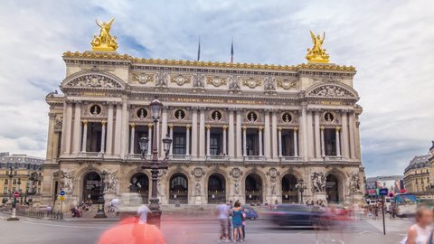 Palais or Opera Garnier The National Academy of Music timelapse hyperlapse in Paris, France. People walking around and traffic on the street.