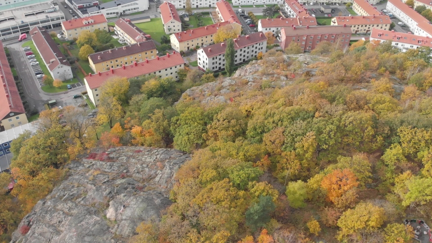 Mountain with Autumn Foliage and Residential Housing Community, Aerial
