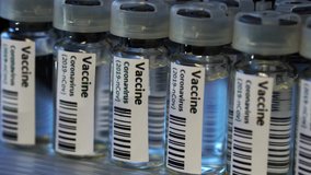 Covid-19 Coronavirus Vaccine Production Line, Cinematic Close Up Of Vaccination Manufacturing. - Powered by Shutterstock - Get 15% off with code: PIKWIZARD15