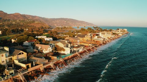Malibu Colony Beach. Real Estate. Most expensive and Luxuries Beach Front properties in Los Angeles County. Cinematic aerial shots of Malibu Communities. Beautiful sunset and ocean view.