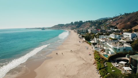 Aerial of famous Carbon Beach in Malibu. Real Estate in California. Most Expensive, Prestigious  and Luxurious Beach Ocean Front Properties. Cinematic Aerial of Malibu Communities. 