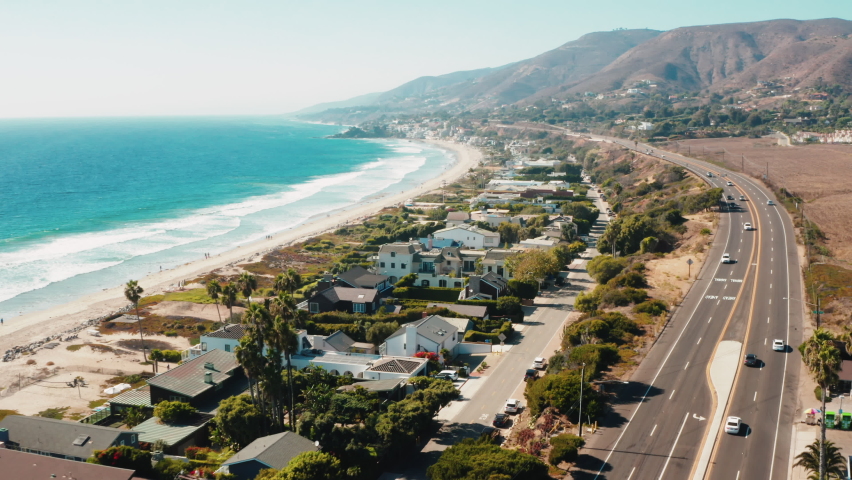 Aerial of Malibu Broad Beach. Real Estate in California. Most Expensive, Prestigious  and Luxurious Beach Ocean Front Properties. Cinematic Aerial of Malibu Communities.  Royalty-Free Stock Footage #1062888052