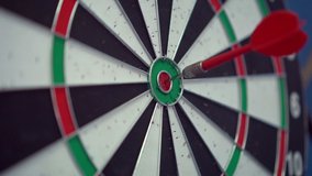 Darts in bull's eye close up. Darts arrows in the target center business goal concept. - Powered by Shutterstock - Get 15% off with code: PIKWIZARD15